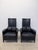 Pair of high back Peggy arm chairs in black leather with dark stained wood frames designed by Umberto Asnago for...