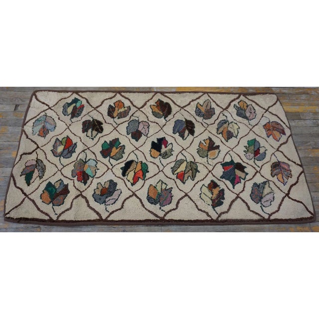 1920s Tan Beige Symmetrical Floral Folk Art Antique American Hooked Rug For Sale - Image 4 of 11