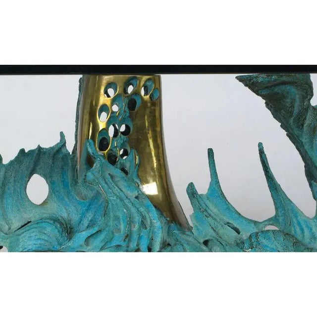 An original Bob Bennett bronze coffee table. Cast from solid bronze, patinated in a aged turquoise finish, with polishing...