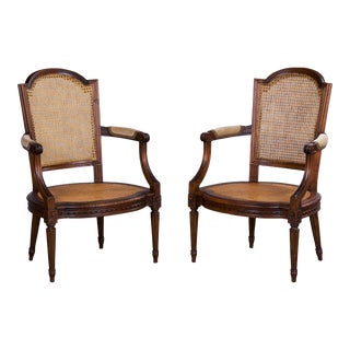 French Louis XVI Style Maple Walnut and Cane Accent Armchairs - a Pair For Sale