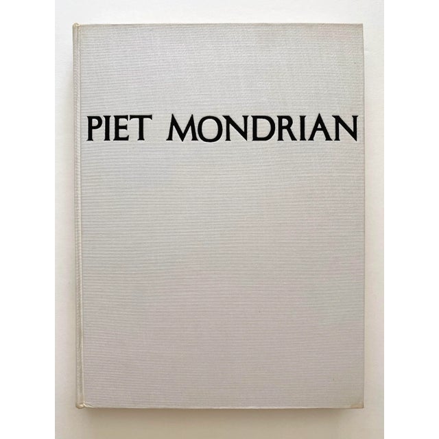 This Piet Mondrian very rare vintage 1971 first edition lithograph print collector's Modernist large hardcover art book is...