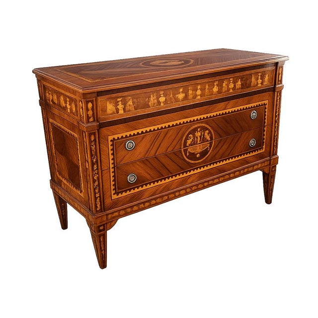 A refined louis xvi-style chest of drawers, crafted with fine veneer in noble woods and embellished with rich geometric...