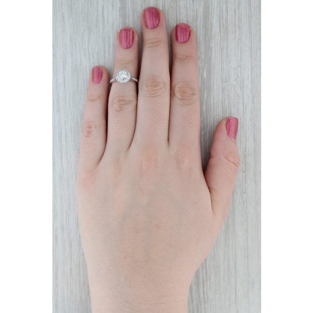 Gemstone Information: - Natural Diamond - Carats - 0.75ct Cut - Round Brilliant Color - K Clarity - VS2 - Natural Diamonds...
