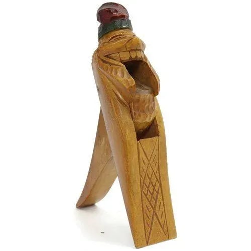 Hand-carved, hand-painted, and full of old-world charm, this folk art Father Christmas nutcracker is no silent night. With...