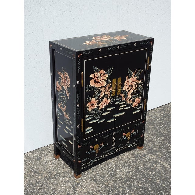 Gorgeous Cabinet in Good Vintage Condition. It is solid and Firm. The Edges on the cabinet have small dings that have been...