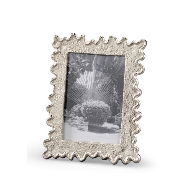 Show off your favorite memory in this whimsical accent that complements any decor. Crafted of aluminum with a hammered...