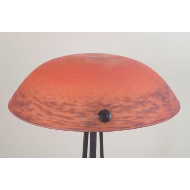 Art Nouveau-Style Table Lamp France, mid-20th century. Decorative table lamp in the Art Nouveau style with a cast-iron...