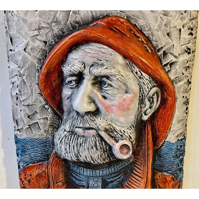 This heavy hand-colored wall relief in cast plaster uses masculinity, it depicts a dutch seaman/captain called Dorus...