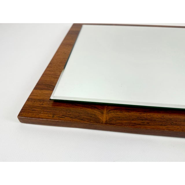 Mid-Century Modern Wall Mirror in Rosewood, 1960s, in Very Good conditions. Designed 1960 to 1969