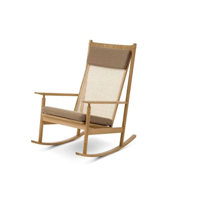 Swing rocking chair rewool oak light syrup by Warm Nordic Dimensions: D91 x W68 x H 103 cm Material: Wood, Foam, Rubber...