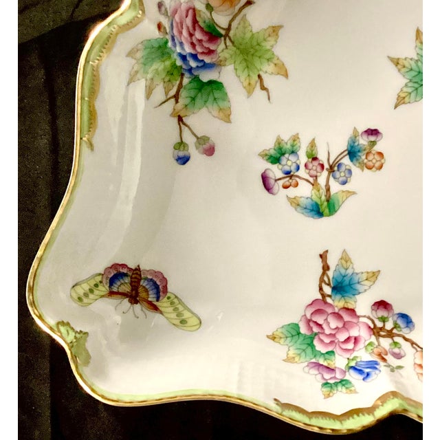 Beautiful Herend Queen Victoria Triangle Dish, 2" deep. Dish has a butterfly and floral pattern on a white background with...