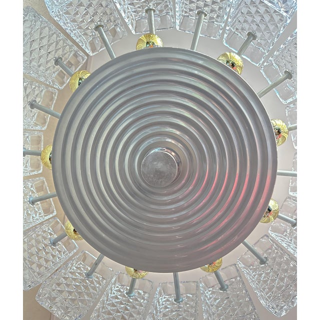 Beautiful mid-century design. Large 1970s chandelier made by the German company Kaiser Leuchten. Gray metal base with...