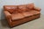 Standard Sofa by Ralph Lauren. Store item #532. It features leather upholstery and wooden base.
