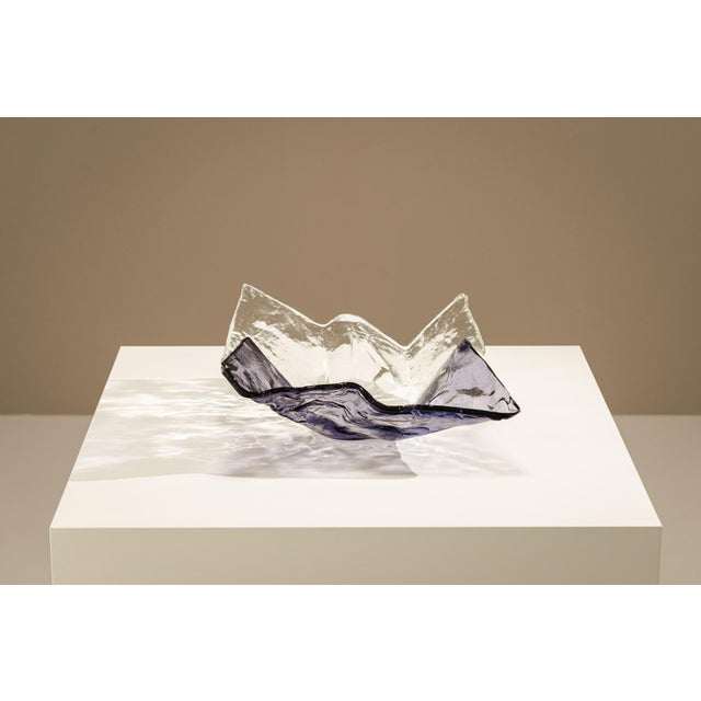 Some objects quietly transform a space through their material presence alone. This sculptural bowl by Carlo Nason for...