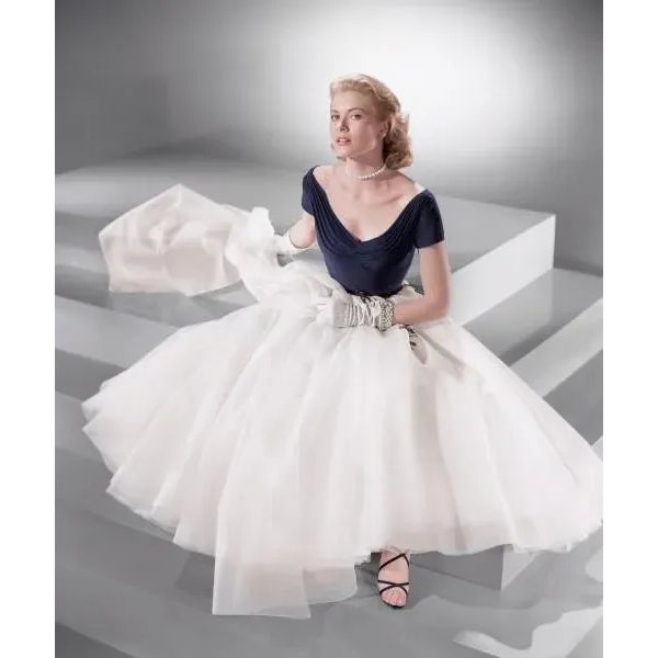 Grace Kelly: Classic Portrait of Elegance This elegant full-length studio portrait features the "Princess of Grace", Grace...