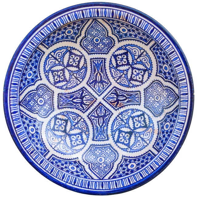 Handcrafted ceramic bowl from Fez, Morocco. Featuring a hand-painted fine Arabesque pattern in blue and white. Signed and...