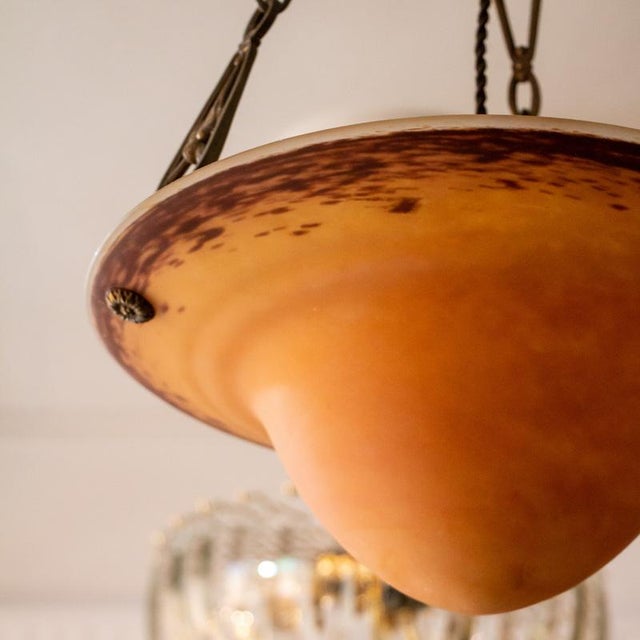 French design based on models by Muller Frères, early 20th century. Art Nouveau style ceiling lamp with a metal frame...