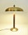 A rare and large swedish modern, art deco table lamp made of brass and leather designed by einar bäckström in the 1930´s....