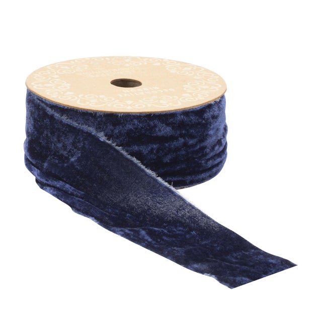 Bring a rich, luxurious touch to your creative projects with our Raw Edge Velvet Ribbon in a deep, dark blue tone. Crafted...