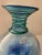 This vintage Blenko Handcraft art glass vase features a distinctive green spiral coil wrapped around the neck. It is hand...