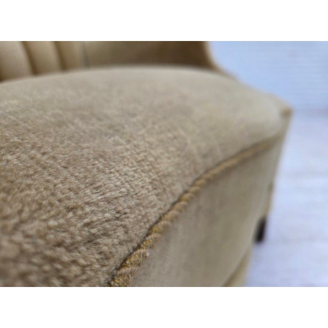 1960s, Danish armchair. Original green furniture velour, oak wood legs, brass springs in the seat. Original good...