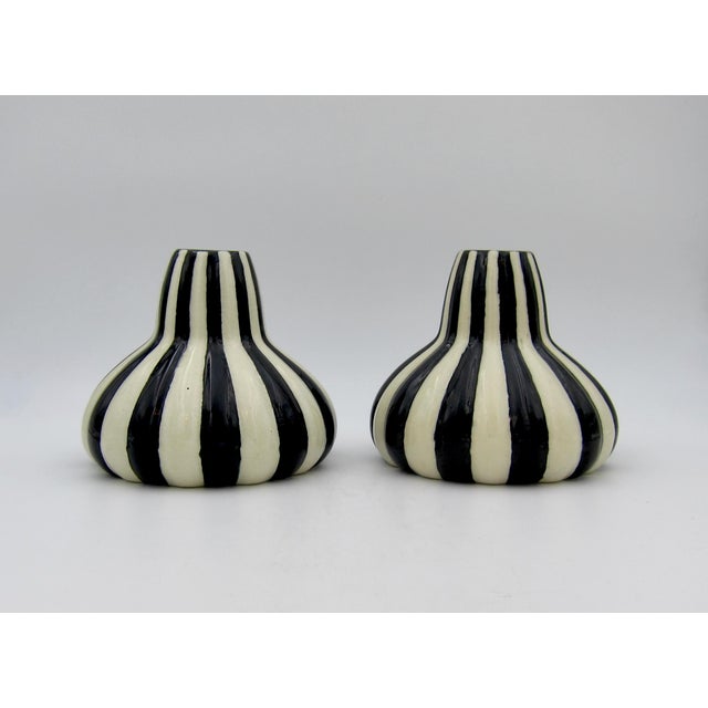 A vintage black and white Art Deco vase pair in glazed earthenware produced by the Steingutfabriken Velten-Vordamm factory...
