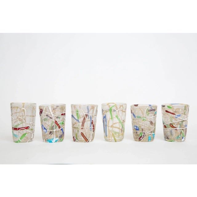 These vibrant abstract hand blown Italian Murano style glasses have applied glass textural forms creating a painterly feel...