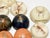 Striking vintage collection of real preserved arachnid specimens, encased in clear resin domes with felted bases. This set...