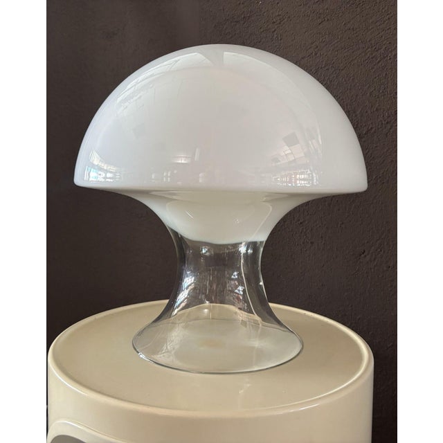 This table lamp, model L-249 , or "cumulus", is made of mouth-blown Murano glass, and designed by Enrico Capuzzo in the...