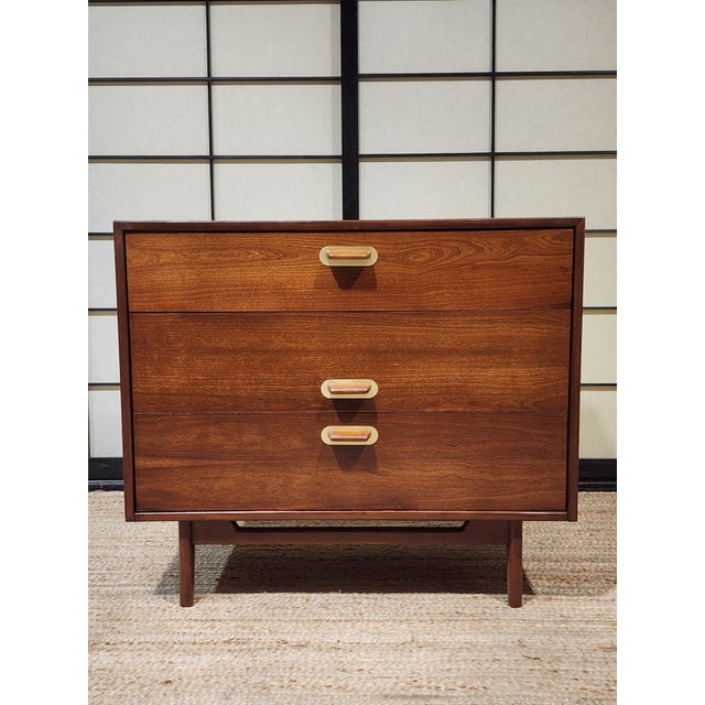 This exceptional three-drawer chest is a quintessential example of mid-century American-Scandinavian modernism, designed...