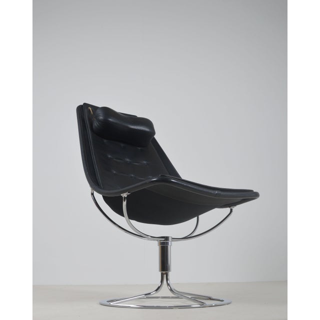 Swedish Jetson 66 armchair designed in 1966 by Bruno Mathsson and manufactured by Dux. This futuristic armchair owes its...