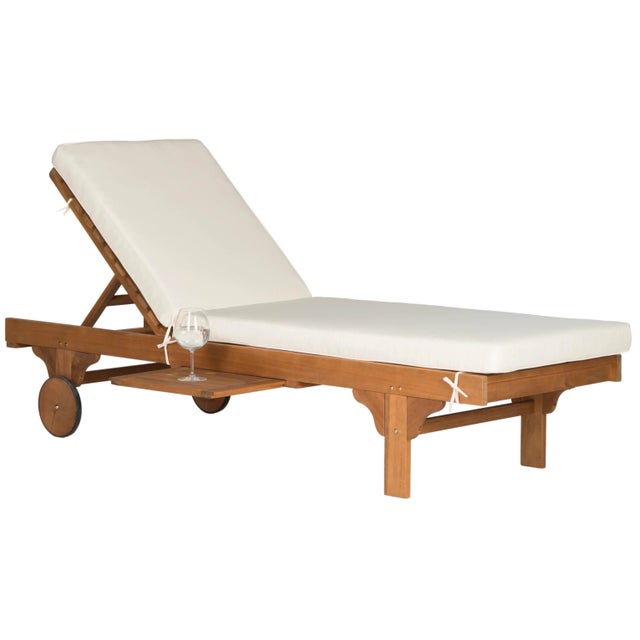 A fresh update of a of a English garden classic, the outdoor chaise lounge chair recalls the manicured landscapes of Rhode...