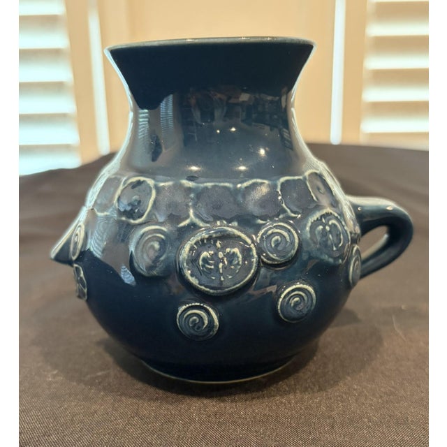 Bjorn Wiinblad for Rosenthal Studio Line Blue Face Mug A happy smiling face with a dimensional nose on one side and a...