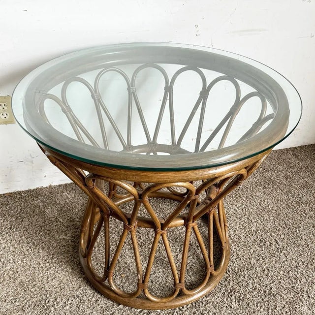 Immerse yourself in the warmth and natural elegance of this Boho Chic Bamboo Rattan Circular Side Table, topped with a...