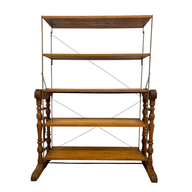 This antique multifunctional piece by the Combination Table Co. is a convertible furniture design dating to the late 19th...