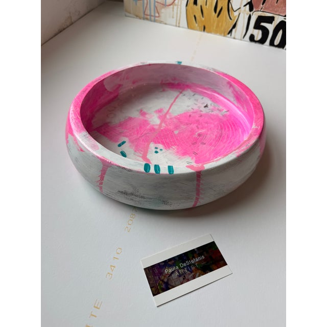 Hand-Painted Hardwood Bowl with Contemporary Design This stunning bowl features a vibrant array of colors and a modern...