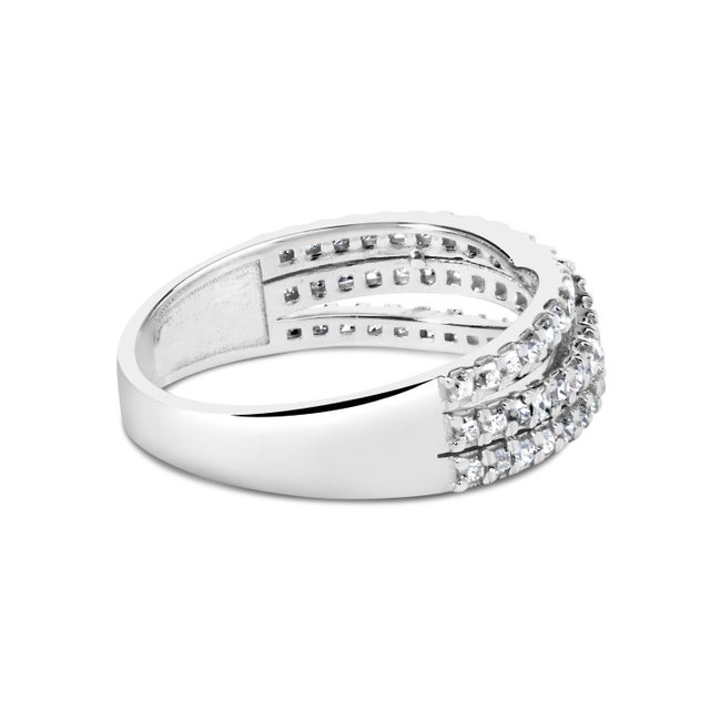 Imbued with the sheer elegance of 10K white gold and enhanced with a protective rhodium plating, this resplendent ring...