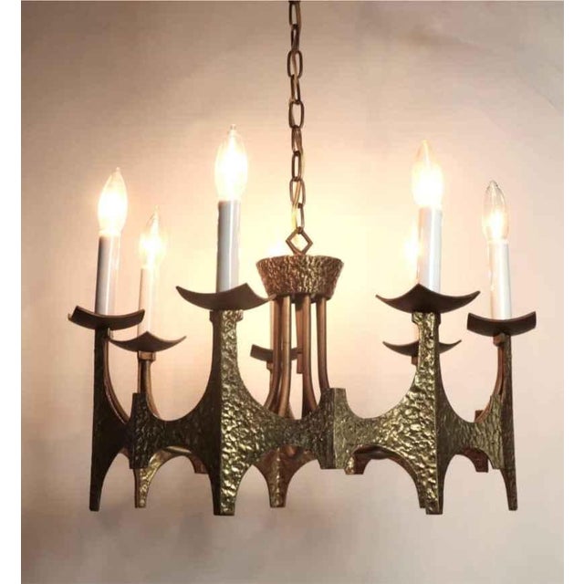 Cool mid century modern Brutalist Chandelier by Moe Bridges. Features solid brass construction with 7 lights & comes with...