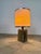 Banco Firenze Table Lamp, 1970s An elegant 1970s table lamp by Banco Firenze, featuring a sculptural silvered bronze base...