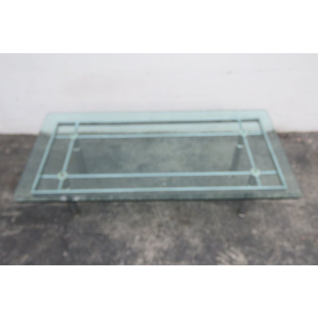 This gorgeous Coffee Table is made of metal and a glass. The Coffee Table has Mid-Century Modern style design, it has...