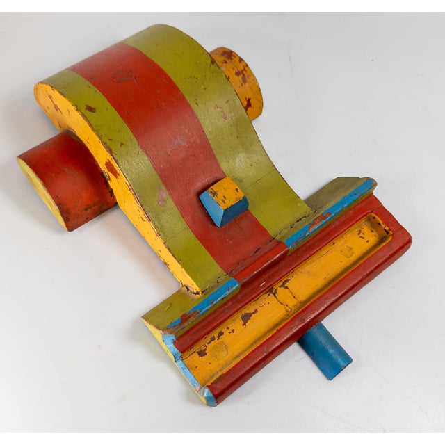We are selling this vibrantly painted Industrial mold. This cool mold has interesting form, almost looks like a race car....