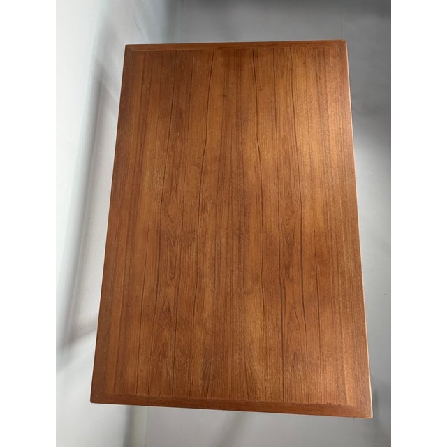 Beautiful Danish dining table dating from the 1960s, crafted from teak. Its timeless design, clean elegant lines and...