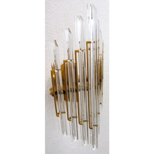 New in Box Liang & Eimil Drop Faceted Glass Rods Wall Lamp Brushed brass finish steel, clear glass faceted rods A quixotic...