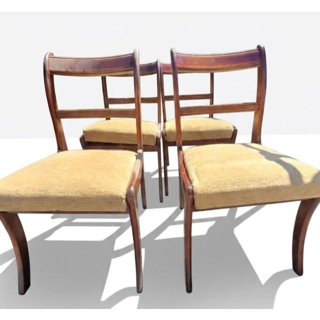 The "Rungstedlund" dining chairs are a classic example of Danish Mid-Century Modern furniture, designed by the renowned...