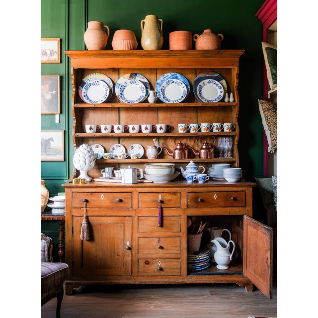 A vintage Welsh hutch, typically dating from the late 18th to early 19th century (circa 1780–1820), features a stepped...