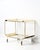 Classic, elegant Art Deco bar cart in brass. France, 1920 - 1930s. Light wear consistent with age and use.