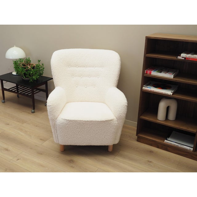 The armchair was made in Denmark, Scandinavian design. The structure is made of wood. Legs made of solid beech wood. Wood...