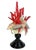 This is a whimsically over-the-top Italian majolica sea shell topiary style figural. This piece features a vivid red coral...