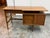Design Plus Gallery presents a Vintage 1970s Mainline Collection Two-Tiered Walnut Desk from Hooker Furniture. The desk...