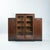 An exceptional Amsterdam School Art Deco cabinet from the Netherlands, crafted in richly figured walnut and dating from...